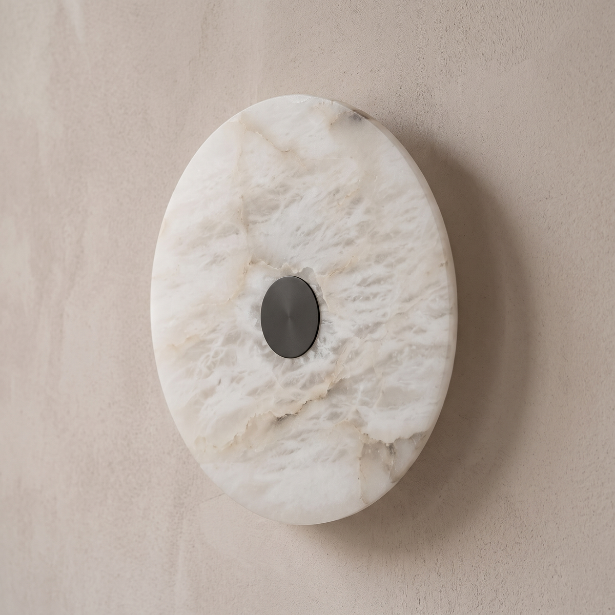 AX318 modern alabaster moon wall light, angled view of the textured white stone disc and slim profile