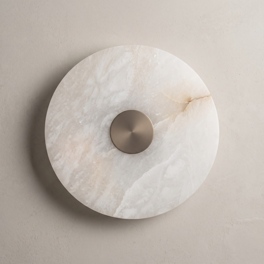 AX318 alabaster wall sconce, front view of the round veined stone disc with a brushed metal center cap